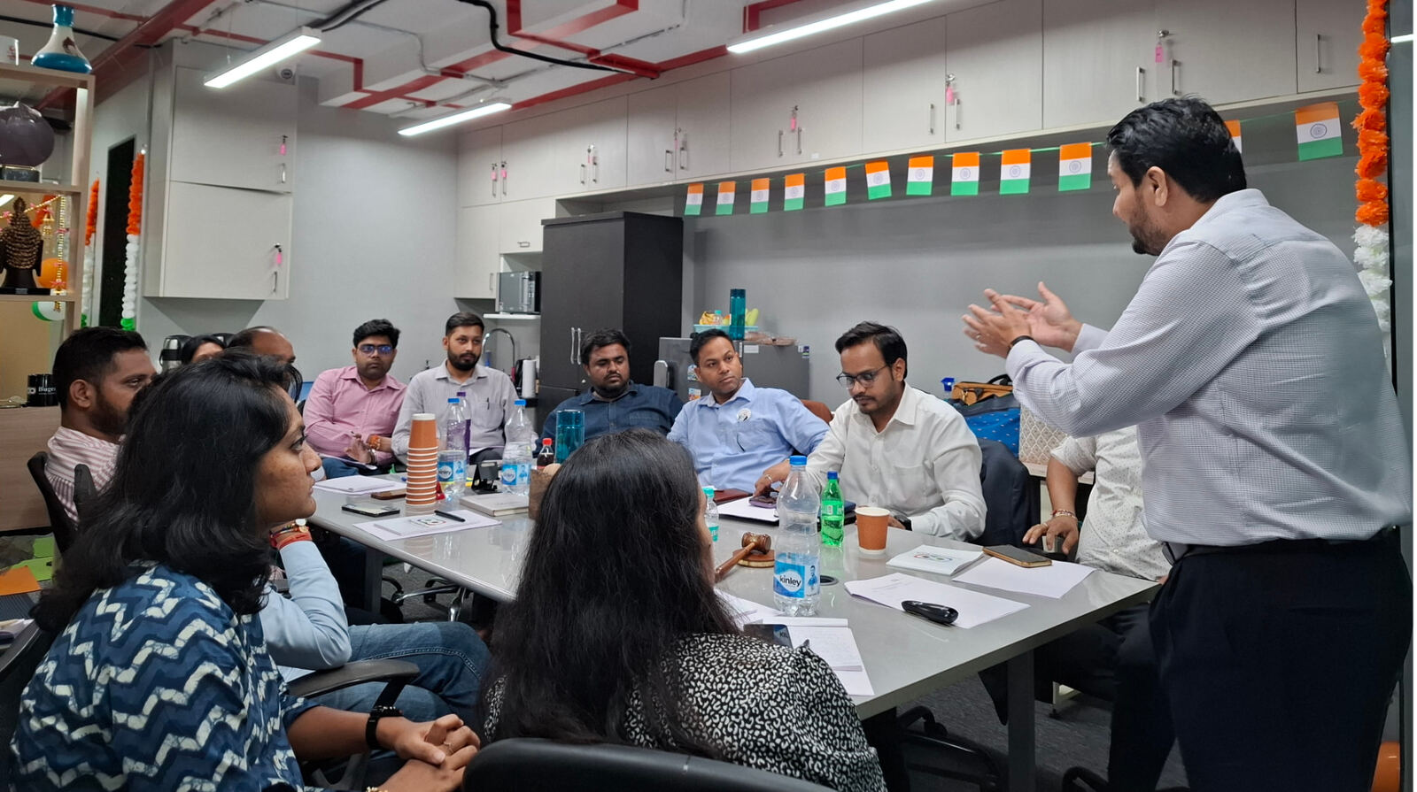 Kalpesh Raichura facilitating a Leadership Rhythm conversation with senior leaders